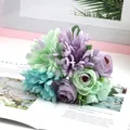 Detailed close-up of soft green and purple silk petals on a decorative artificial bouquet - Blue Green Purple