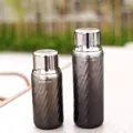 Deux bouteilles d'eau en titane pur isolées sous vide avec texture gris métallisé - 350ml / Argent