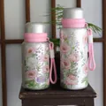 Elegant floral print insulated stainless steel water bottle with handy pink carrying strap - 600ml / Pink