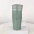 Sage green insulated stainless steel coffee tumbler with textured non-slip grip sleeve - 420ml / Green