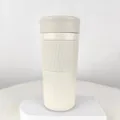 Minimalist cream white stainless steel insulated coffee mug with protective silicone grip - 420ml / Off White