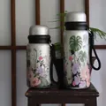 Silver titanium insulated bottle with 3D floral print and black carrying strap - 600ml / Black