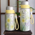 Stylish 3D floral printed titanium-coated insulated thermos bottle with yellow strap - 600ml / Yellow