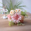 Close-up of artificial pink dahlia and peach rose bridal bouquet for elegant home decoration - Pink