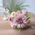 Close-up of artificial bridal bouquet with pink dahlia and roses on a wooden table - Rose Purple