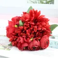 Detailed macro view of artificial red gerbera and rose bouquet for home table decoration - Red