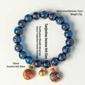 Bracelet élégant en perles de verre bleues avec des breloques de créature mythique - Famille de Bête Tunjin Bleue / 10mm