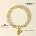 Natur-Goldrutinquarz und Hetian-Jade Perlenarmband mit Erdnuss-Anhänger. - Natürliches Goldrutilquarz Armband / 8mm Perlendurchmesser
