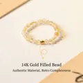 Natürlicher Gold-Rutilquarz-Perlenring mit einer 14K goldgefüllten Perle im Detail - Einheitsgröße / Facettierter Citrin