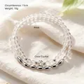 Bracelet élégant en quartz clair 4mm avec breloques en métal en forme de riz - Bracelet Double Boucle Cristal Blanc / Diamètre des perles 4MM