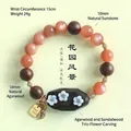 Bracelet vintage en perles de pierre de soleil et bois d'agar avec fleur et breloque - Pierre de Soleil Trois Fleurs / Diamètre de perle 10mm