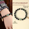 Pulsera de cuentas de incienso natural con dije de calabaza verde y etiqueta dorada - 8mm / Verde