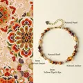 Elegant beaded bracelet set featuring natural pearls, flower amber, and tiger eye. - Bracelet