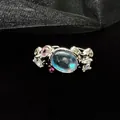 Close-up of moonstone and colored zircon stones on an irregular silver ring - Adjustable Open Size / Style 3 (ALk5JxmTKa5)
