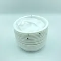 A stack of white disposable vomit bags designed for car travel, motion sickness, and emergencies - 1000ML / White