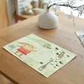 Linen placemat with a cute cartoon girl print on a wooden dining table with a silver fork. - 7848-2(红衣女孩网蝶款) / 32*45cm