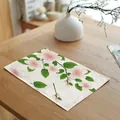 Detailed view of rectangle placemat with pink flower and green leaf pattern on wood table - 樱桃花绿叶款式(7823-2) / 32*45cm