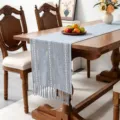 Blue boho table runner with tassels on a wooden dining table - 33x120cm / Light Blue