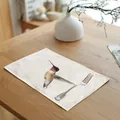 Close-up of linen cotton placemat featuring a vivid watercolor hummingbird illustration - 32x45cm / Colorful Hummingbird (7003-12)