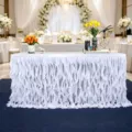 Elegante falda de mesa blanca con volantes para bodas y decoración de mesas de postres - Blanco