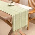 Green linen table runner with tassels on a wooden dining table - 33x120cm / Light Green
