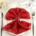 Elegant red cheesecloth napkin with silver rings for wedding and party table decoration. - 44x44cm / Red