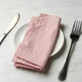 Pink cotton linen cloth napkin on white plate with fork and knife - 32x32cm / Pink