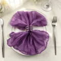 Elegant purple cheesecloth gauze napkin styled with a silver ring on a white plate - 44x44cm (1 Piece) / Deep purple