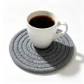 Minimalist hand-woven grey cotton rope coaster with elegant round braided texture design - Diameter 11cm / Dark Gray