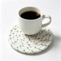 Round hand-woven cotton rope coaster in off-white with black flecks for hot mugs - Diameter 11cm / Black and White Spotted (23)