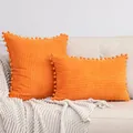 Fundas de cojín de pana naranja vibrante con pompones para una decoración de sofá acogedora y chic - Naranja / 50*30cm