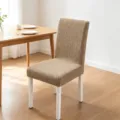Stretch jacquard dining chair cover in brown with textured chevron weave pattern - One Size / 星链卡其