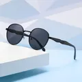 Modische schwarze runde Sonnenbrille für Damen mit einem geometrischen Bügeldesign - Schwarzer Rahmen Schwarz Graue Gläser