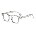 Retro round frame glasses in grey transparent finish with decorative rice nail accents - Transparent Grey Frame Clear Lens