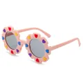 Occhiali da sole a fiore rosa per bambini con montatura rotonda opaca e cuori colorati. - Montatura Rosa Pesca Lenti Grigie