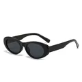 Retro Sonnenbrille für Damen mit schwarzem ovalem Rahmen und Vintage-Cat-Eye-Design. - Schwarzer Rahmen Graue Gläser