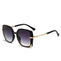 Gafas de sol poligonales degradadas moradas mujer patillas doradas - Montura Negra Lente Gris Doble