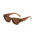 Stylische Vintage-Cateye-Sonnenbrille mit breitem Schildpatt-Rahmen und braunen Gläsern. - Schildpatt Rahmen Tee Gläser