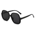 Lunettes de soleil carrées oversize pour femmes en noir classique avec un style rétro chic - Monture Noire Verres Noir Gris