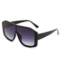 Occhiali da sole oversize poligonali con montatura nera e lenti sfumate color viola. - Montatura Nera Lente Grigio Sfumato