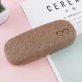Elegantes Brillenetui aus braunem Leinen mit minimalistischem Brillen-Icon-Design - Anti-Blaulicht Klar / Violetter Rahmen Mit Etui Und Tuch