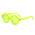 Neon green translucent round frame sunglasses with wide temples on white background - Neon Green