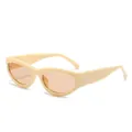 Retro cat-eye sunglasses with cream frame and tinted lenses for trendy style. - Off-White Frame Tea Lens