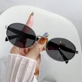 Retro vintage oval metal frame sunglasses with dark lenses for women fashion accessory - Silver Frame Grey Lens