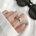 Minimalist 925 sterling silver open ring with a smooth polished finish worn on the finger - Adjustable Open / Silver
