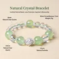 Handmade beaded bracelet featuring clear white crystal and green prehnite with a silver lotus charm - 15cm Circumference (8/10/12mm Beads) / Prehnite
