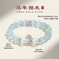 Elegante armband van natuurlijke aquamarijn en kristal met een zilveren paardebedeltje - 8mm Aquamarijn Pony Armband / Handomtrek 15cm / Aqua