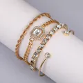 Dettaglio set 4 bracciali vintage dorati con gemme sintetiche e stile punk - Set Catena in Strass Tipo H