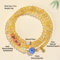Pulsera multicapa de cuarzo rutilado dorado natural con cianita y perla elegante - Pulsera de Cianita y Cuarzo Rutilado Natural de 5mm
