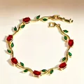 Elegante bracciale a tralcio di tulipano dorato con gemme rosse e foglie di zircone - Oro Zirconia Rossa con Foglie Verdi